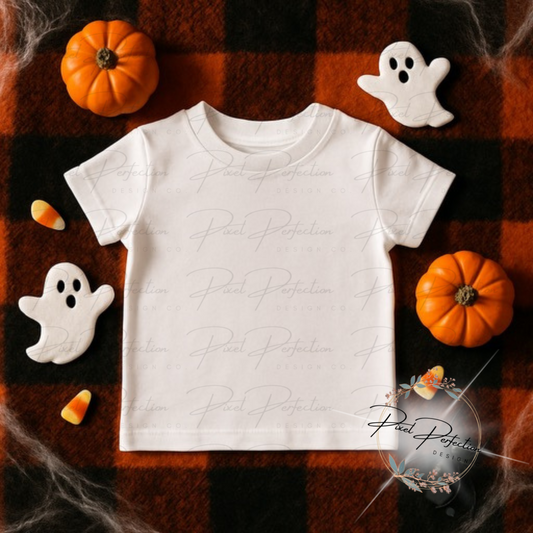 Kids white T-shirt flat lay with Halloween decor on orange and black checkered background digital file